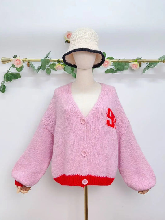 Gilet à manches longues avec motifs et boutons